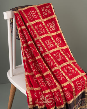 Beautiful Red and black Bandini gharchola saree with ajrak border and blouse