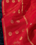 A lovely red Crepe seilk saree with zari checks