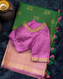 Kanjeevaram saree in a beautiful shade of green and pink