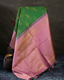 Kanjeevaram saree in a beautiful shade of green and pink
