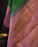Kanjeevaram saree in a beautiful shade of green and pink