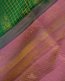 Kanjeevaram saree in a beautiful shade of green and pink