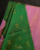 Kanjeevaram saree in a beautiful shade of green and pink