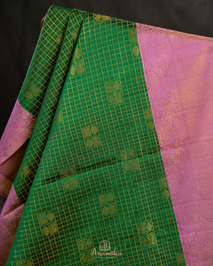 Kanjeevaram saree in a beautiful shade of green and pink