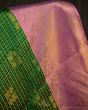Kanjeevaram saree in a beautiful shade of green and pink