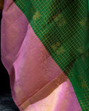 Kanjeevaram saree in a beautiful shade of green and pink