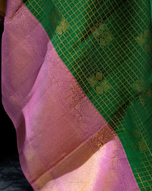 Kanjeevaram saree in a beautiful shade of green and pink