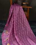 Organza silk saree in lavender with a contrast yellow handwork blouse