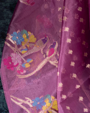Organza silk saree in lavender with a contrast yellow handwork blouse