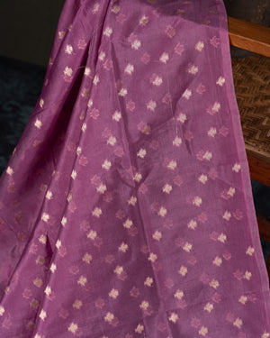 Organza silk saree in lavender with a contrast yellow handwork blouse