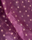 Organza silk saree in lavender with a contrast yellow handwork blouse