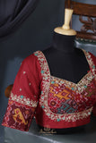 Handloom Mulcotton Saree in aqua blue paired with a designer patola blouse