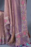 Gorgeous lavender tissue Saree with petite embroidered border