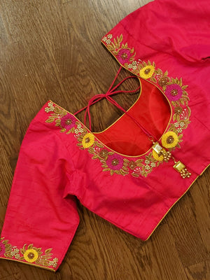 Red blouse with yellow floral work