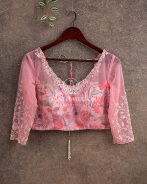 Pastel Pink Sequins Georgette saree with a floral blouse