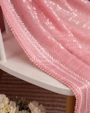 Pastel Pink Sequins Georgette saree with a floral blouse