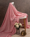 Pastel Pink Sequins Georgette saree with a floral blouse