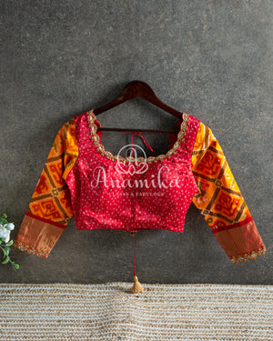 Red Bandini Saree with a Fusion concept Patola Blouse