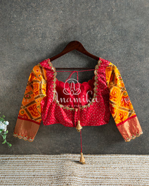 Red Bandini Saree with a Fusion concept Patola Blouse