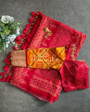 Red Bandini Saree with a Fusion concept Patola Blouse