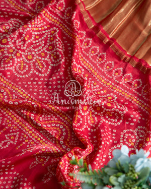 Red Bandini Saree with a Fusion concept Patola Blouse