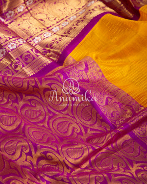 Yellow/Purple Kanchi kuppadam saree with contrast checkered blouse