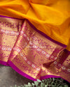 Yellow/Purple Kanchi kuppadam saree with contrast checkered blouse