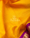 Yellow/Purple Kanchi kuppadam saree with contrast checkered blouse