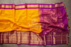 Yellow/Purple Kanchi kuppadam saree with contrast checkered blouse