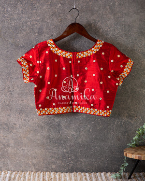 Tangerine Orange Kora Banarasi saree with beautiful red handwork blouse