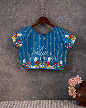 Pure silk Bandini with patola border - paired with a beautiful short sleeves handwork blouse