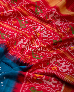 Pure silk Bandini with patola border - paired with a beautiful short sleeves handwork blouse