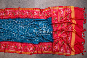Pure silk Bandini with patola border - paired with a beautiful short sleeves handwork blouse