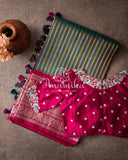 Dark Green Gadwal Pattu saree with a pink border