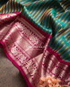Dark Green Gadwal Pattu saree with a pink border
