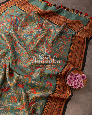 Kalamkari saree on Tussar Silk - paired with a lovely heavy thread work blouse
