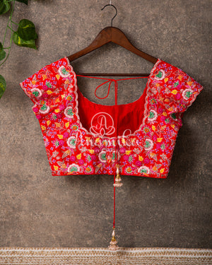 Lavender Georgette saree with handwork scallop border and a contrast red heavy work blouse