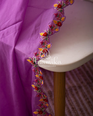 Lavender Georgette saree with handwork scallop border and a contrast red heavy work blouse