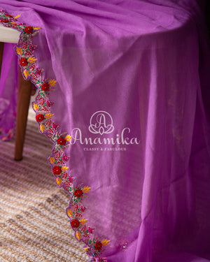 Lavender Georgette saree with handwork scallop border and a contrast red heavy work blouse