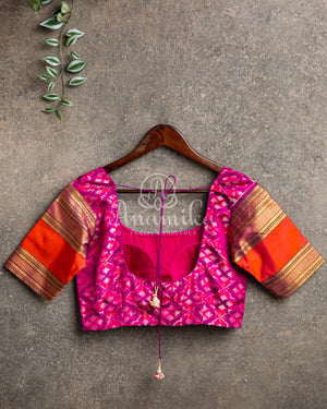 Orange Twill Ikkat saree with a beautiful kanchi border and pallu