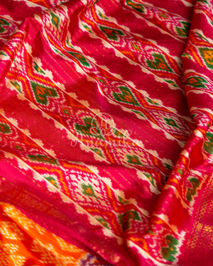 Orange Twill Ikkat saree with a beautiful kanchi border and pallu