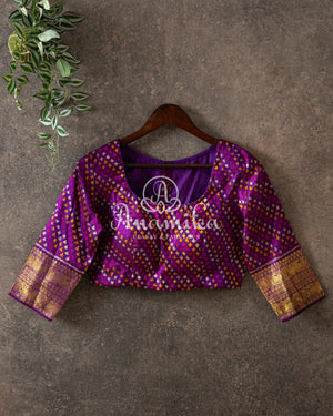 Biege Twill Ikkat saree with a beautiful kanchi border and pallu