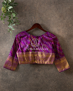 Biege Twill Ikkat saree with a beautiful kanchi border and pallu