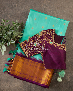 Teal Blue Gadwal Silk saree with contrast dark purple border