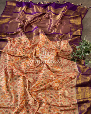 Biege Twill Ikkat saree with a beautiful kanchi border and pallu