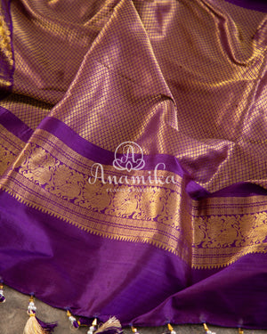 Biege Twill Ikkat saree with a beautiful kanchi border and pallu