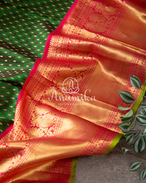 Green Kanchipattu saree with intricately designed work blouse