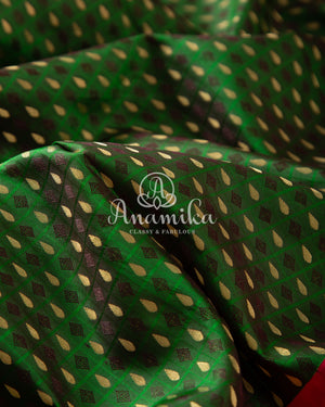 Green Kanchipattu saree with intricately designed work blouse