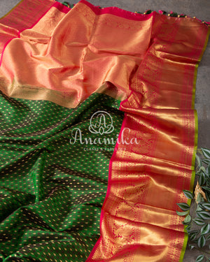 Green Kanchipattu saree with intricately designed work blouse