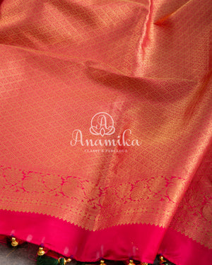 Green Kanchipattu saree with intricately designed work blouse